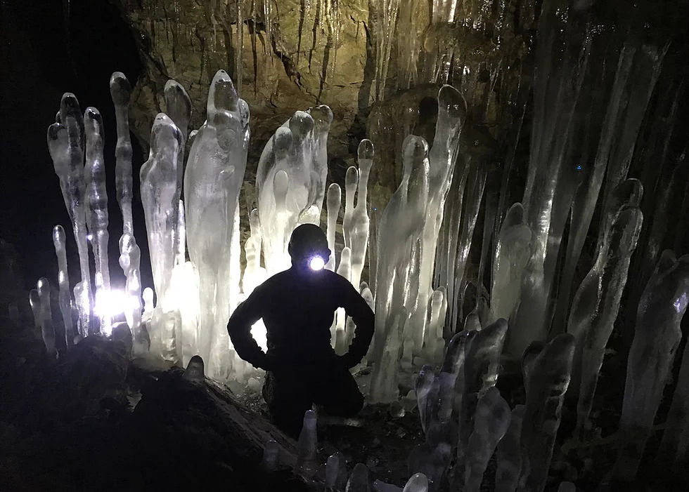 Discover cool ice formations in an underground world with Cody Cave Tours between mid-December and February.